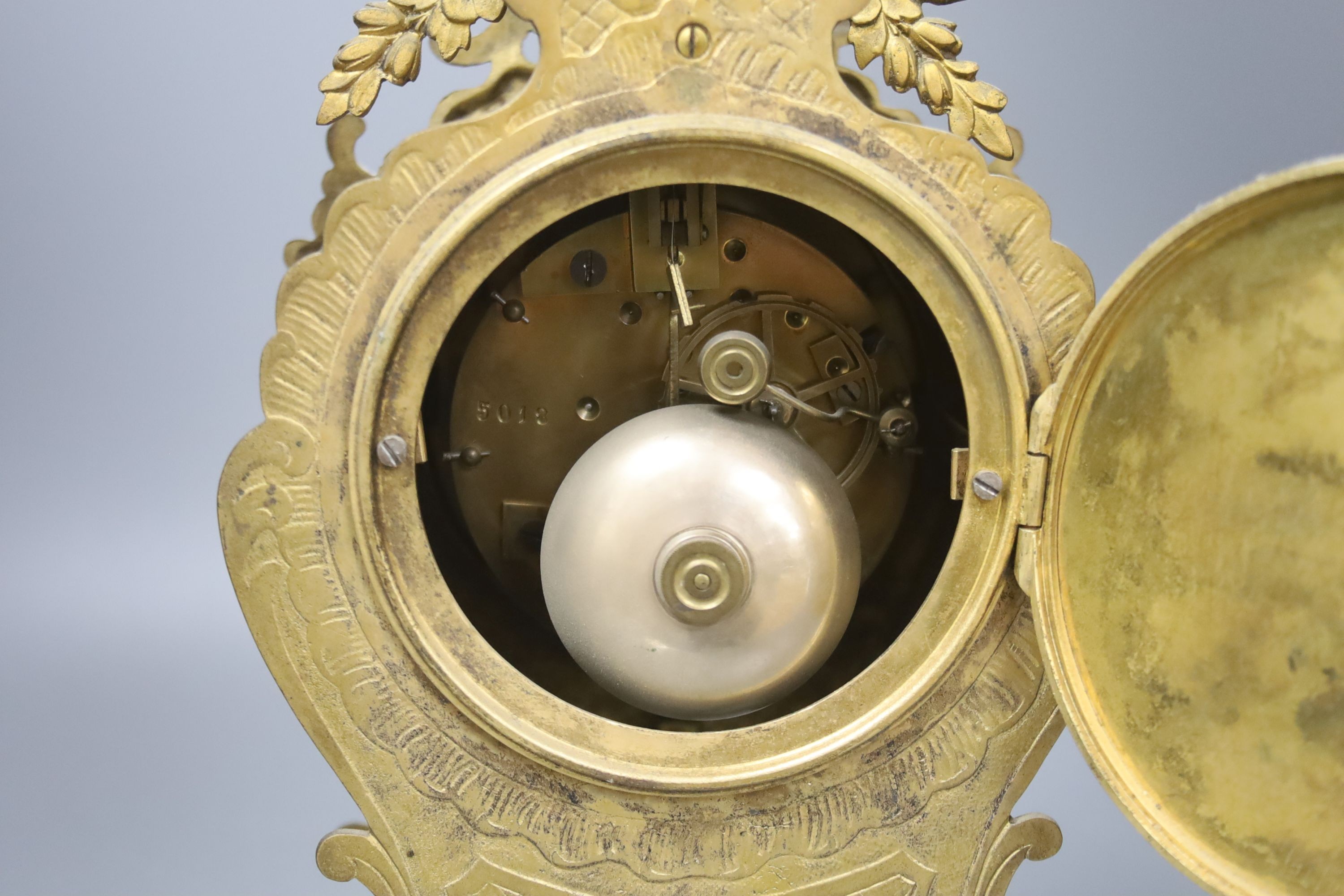 A late 19th century French gilt brass mantel clock, 40 cm high.